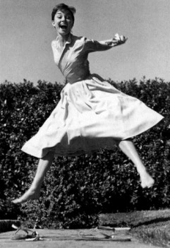 Audrey-Hepburn-laughing-and-jumping-mylusciouslife.com_
