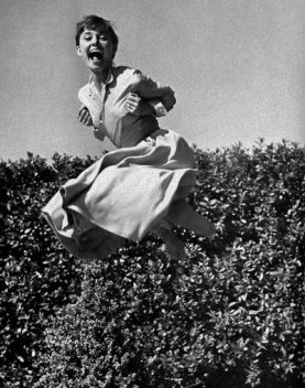 Audrey-Hepburn-laughing-and-jumping-photo-mylusciouslife.com_